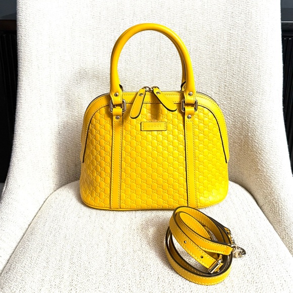 Authentic Gucci small crossbody bag yellow Guccissima leather top handle bag